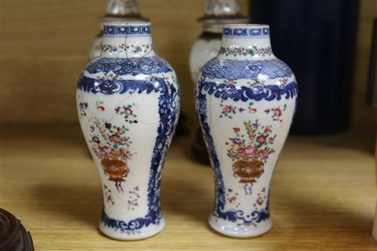 A pair of Chinese famille rose vases, a pair Samson vases and cover, and an Imari vase and cover smallest 15cm, tallest 22cm